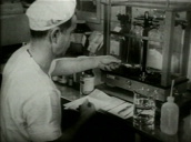 Technicians manufacturing polio vaccine&sbquo;  Pittsburgh; 1950\%27s