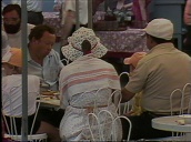 Workers shop&sbquo;  dine and sightsee on their annual holiday&sbquo; Yalta; 25 Jul 86
