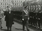 King Gustaf VI Adolf of Sweden walking alongside Austrian President Adolf Schärf inspects troops on official state visit&sbquo;  Vienna; 1961
