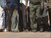 Marching legs of demonstrators undertaking protest&sbquo;  Democratic Republic of Congo