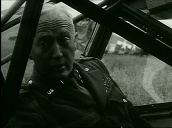 General George S Patton climbs into light aircraft during World War II; 1940\%27s