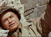 Hollywood actor Edward G Robinson talks to US troops on visit to Mont Saint-Michel during entertainment tour&sbquo;  Normandy; 1944