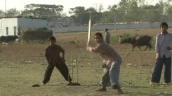 Children play cricket in park&sbquo;  India