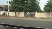 Track right past entrance of Insein Prison where human rights activist Aung San Suu Kyi is held ahead of her trial&sbquo;  Yangon; 14 May 2009