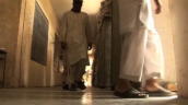 Former child Taliban soldiers walk along corridor step through doorway&sbquo;  Pakistan: 3 August 2009
