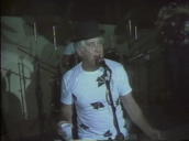 Train robber Ronnie Biggs singing on stage with son Michael at family party marking 20th anniversary of his escape from prison&sbquo;  Brazil;&sbquo; Brazil; July 1985