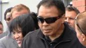 Boxing legend Muhammad Ali removes his glasses during visit to sports club in Manchester&sbquo;  UK; 26 August 2009