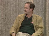 Sir Michael Parkinson talks to John Cleese about how he became a comedian rather than an accountant; October 1980