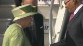 Queen Elizabeth II arrives at Piarco International Airport and is greeted by Prime Minister Patrick&sbquo;  Trinidad; 27 November 2009