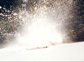 Huge splash is followed by a plume of rising rust particles and white sea foam as HMS Brilliant weighs anchor into sea.