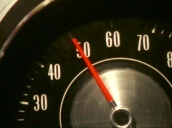 Driver in car&sbquo;  cut to speed dial set at 50 mph&sbquo; Speed limits due to petrol crisis; 20 Nov 73
