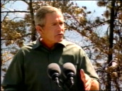 George W Bush talking from podium to seated forestry workers and forest fire fighters&sbquo;  says "The fire prevention strategy of our country has been short sighted&sbquo; we frankly hadn\%27t done a very good