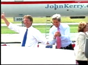 John Kerry and John Edwards clapping and pumping fists in air at Democrat rally at airport&sbquo;  West Virginia; 09 Jul 04