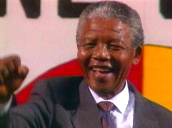 Crowds cheering Mandela as he dances on stage following election win&sbquo;  Pretoria; 10 May 94