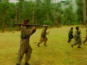 Kashmir militant rebels with covered faces&sbquo;  walk near forest carrying AK 47\%27s&sbquo; Kashmir; 2001