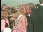 President Jimmy Carter is kissed by beauty queen&sbquo;  who wipes lipstick off his cheek during campaign trail&sbquo; Tennessee; 10 Oct 80