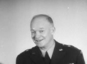 General Dwight D Eisenhower asks how long he\%27s got left to speak and smiles&sbquo;  Lancaster House; 17 Jan 51