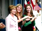 Laura Bush is applauded by her daughters: Jenna and Barbara&sbquo;  at election victory celebrations&sbquo; Washington DC; Nov 04
