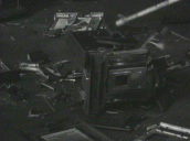 Policeman smashes illegal slot machine with sledgehammer in warehouse&sbquo;  USA; 1930\%27s