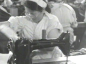 Japanese students at sewing machines making naval uniforms at clothing depot&sbquo;  World War II&sbquo; Japan; 1940\%27s