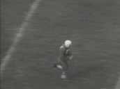 Quarterback passes ball to running back who runs five yards before fumbling ball in tackle&sbquo;  defensive back gains possession of ball in turnover and makes ninety yard run for touchdown in collegiate A