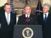 US President George W Bush with former presidents George Bush Snr and Bill Clinton at podium giving presser about tsunami aid at Sri Lanka Embassy&sbquo;  Washington DC; 03 Jan 05