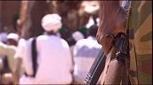 African Union (AU) peacekeeper guards Sudanese village&sbquo;  Darfur; 2006