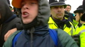 Policemen forcefully move animal rights activists protesting against Huntingdon Life Sciences from a motorway&sbquo;  protestors shout \%27lost it\%27 in retaliation&sbquo; Cambridgeshire; 2000