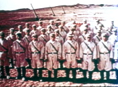 Pan left across rows of Chinese military servicemen wearing white uniform&sbquo;  China; 1960\%27s