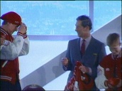 Prince William tries on and poses in sports team hat and jacket as Prince Charles and Prince Harry look on smiling&sbquo;  Canada; 20 Jun 98