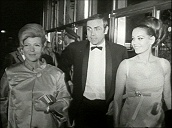 Actor Sean Connery steps from car accompanied by Hollywood star Rita Hayworth and actress Claudine Auger ahead of film premiere&sbquo;  Vienna; May 66