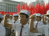 North Korean citizens demonstrate and march shaking fists in unison demanding unification of Korean peninsula following death of leader Kim Il Sung&sbquo;  Pyongyang; Aug 94